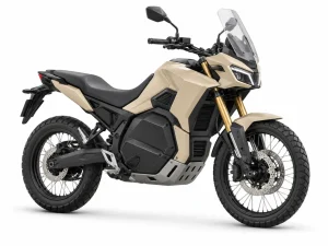Generic sand-coloured electric motorcycle on a white studio background